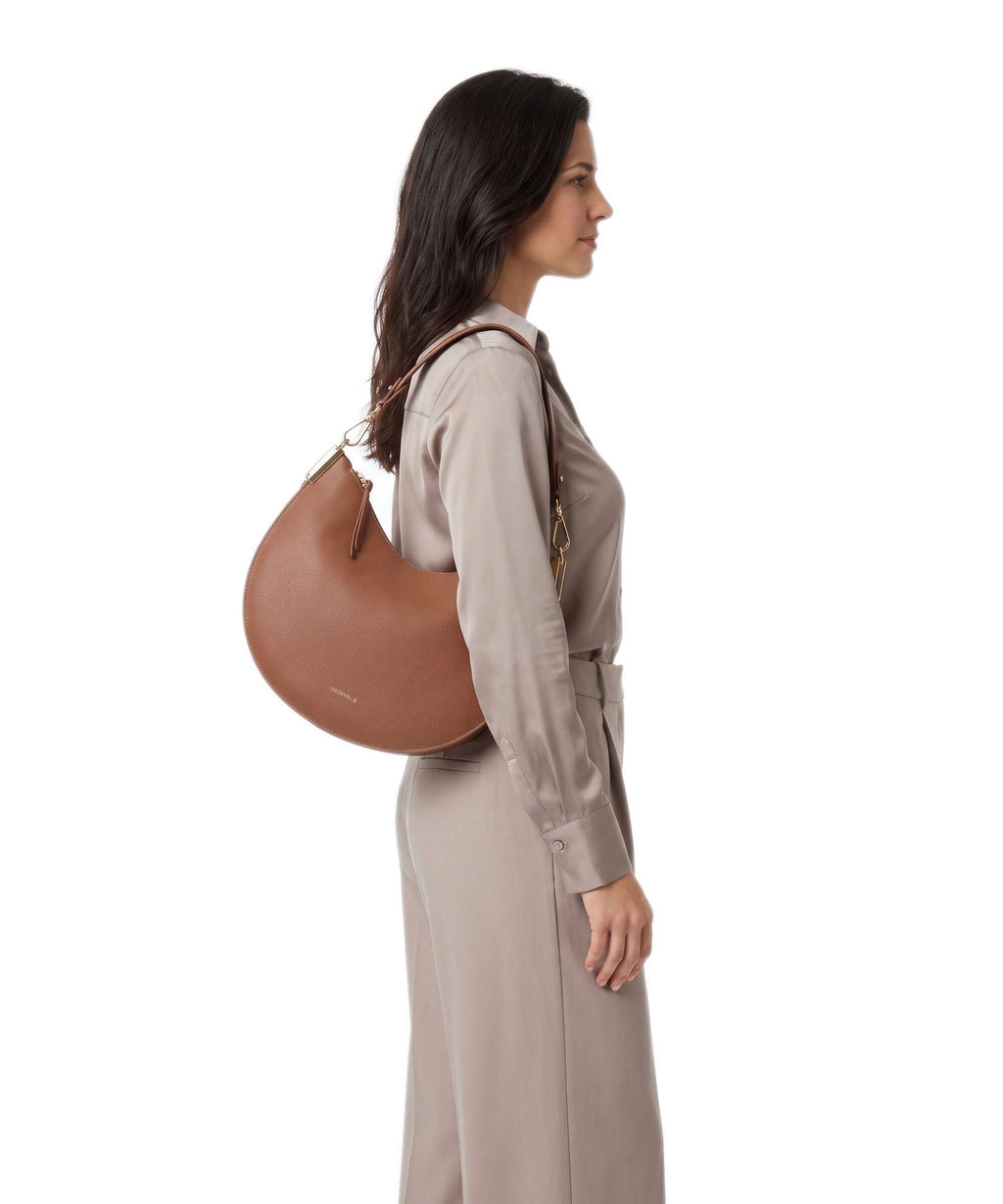 Coccinelle Sunup Hobo bag cognac/noir